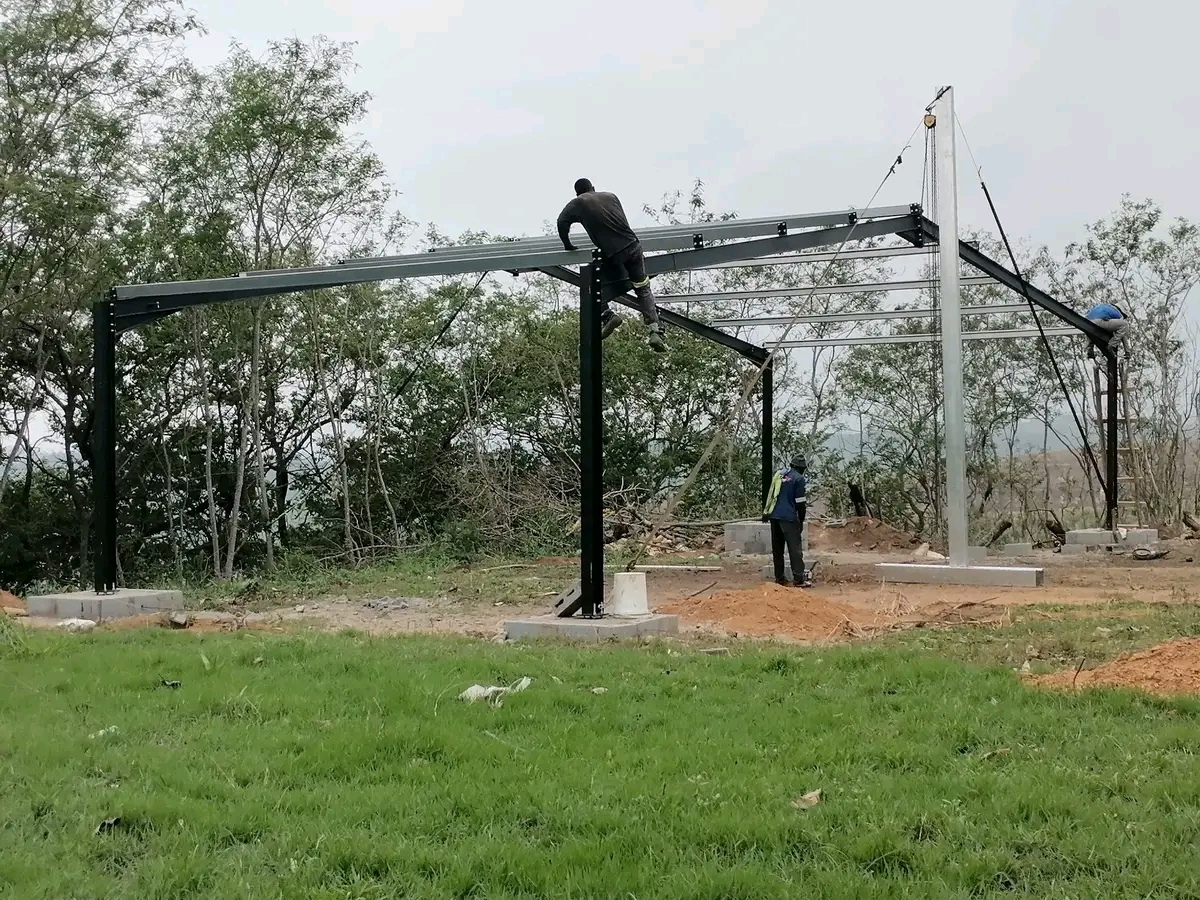 Steel frame structure being installed on a construction site